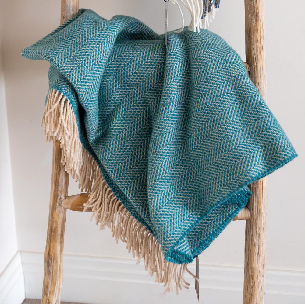 Discover the Elegance of John Hanly: Blankets and Scarves Now Available at Triona